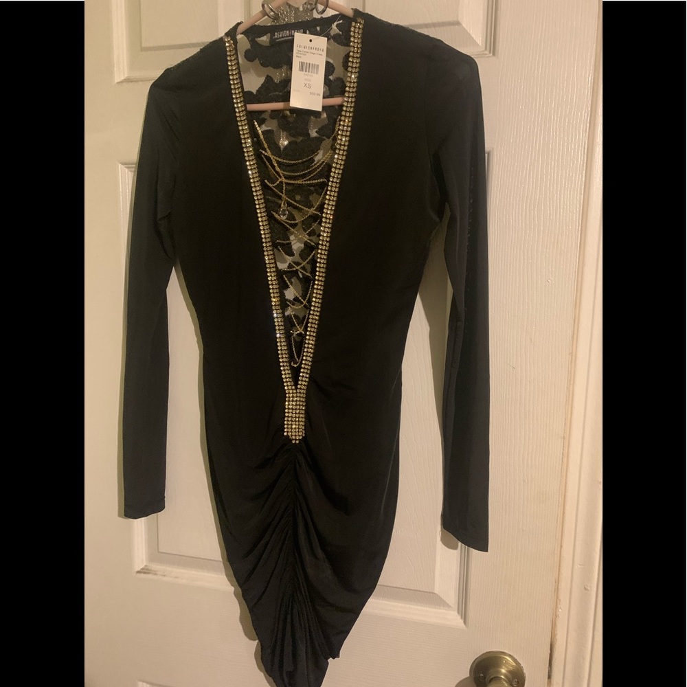 See thru black dress.